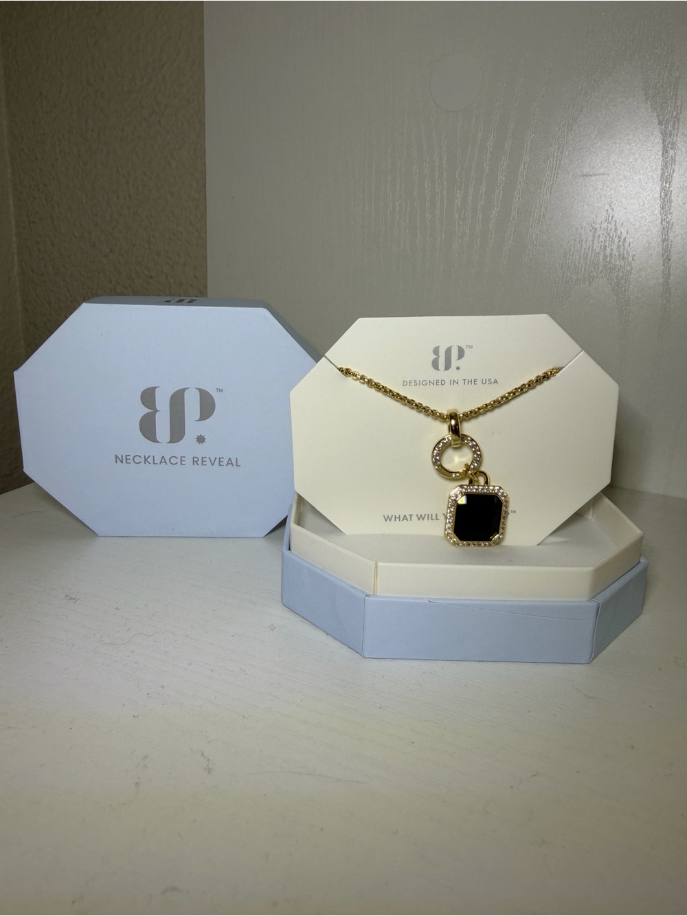 Gold Chain with Black Pendant